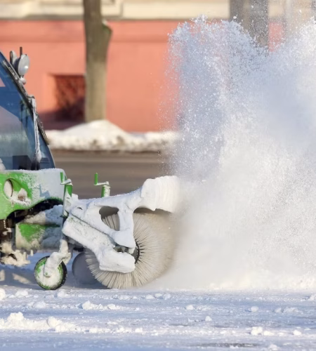 special machine for snow removal cleans the road